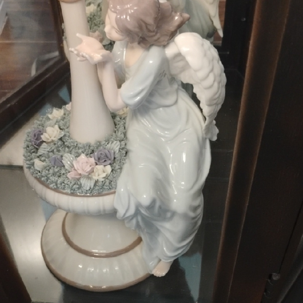 Charming Angel Figurine with Floral Details